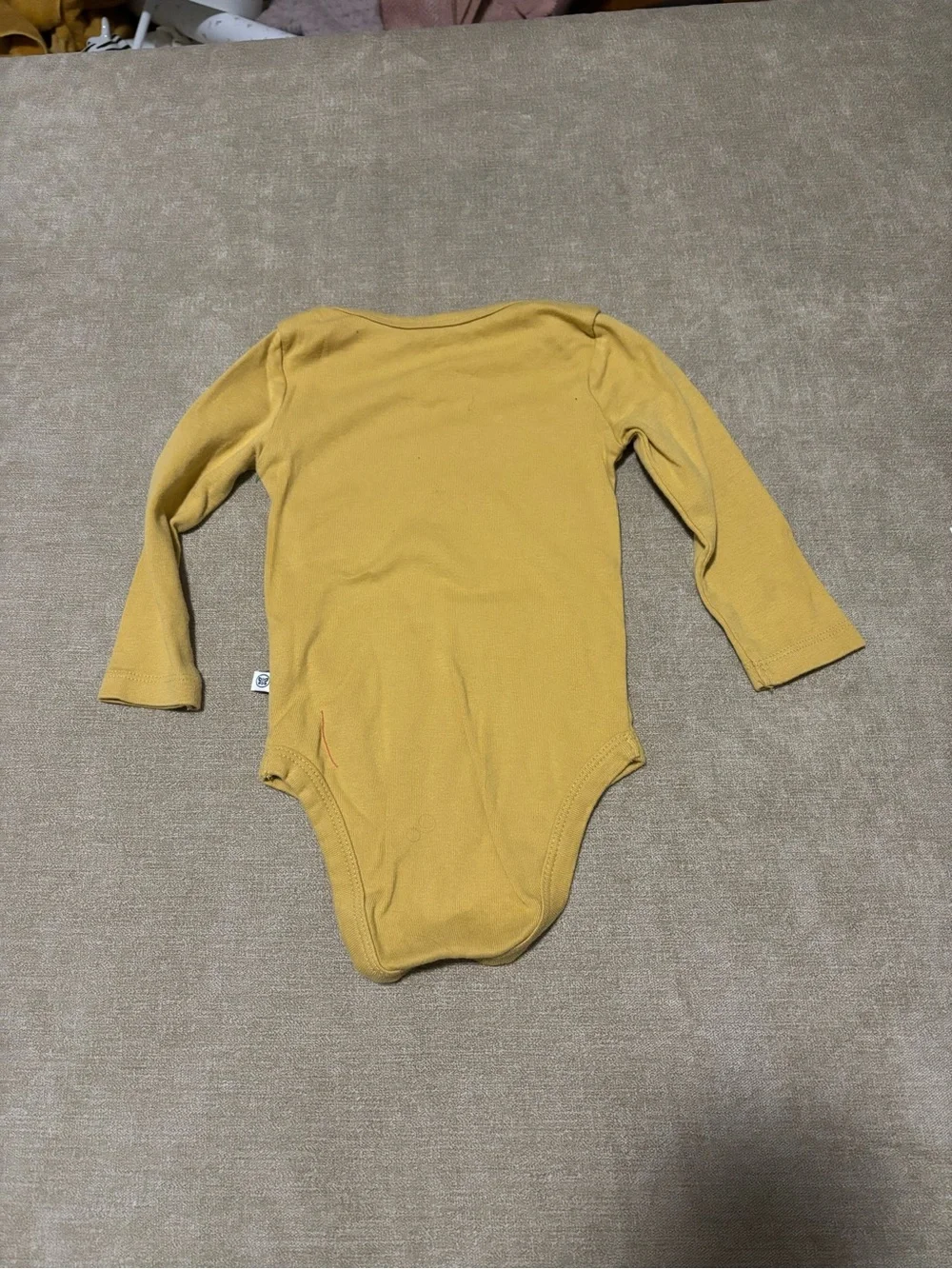 The Honest Company Mustard Long-Sleeve Baby One-Piece